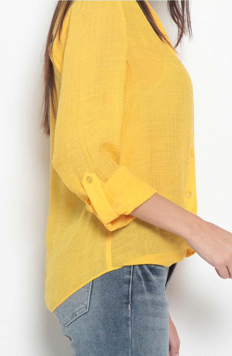 BLUSA MANGA LARGA ESCOTE V ABOTONADA EN DELANTERO CON BOLSILLO